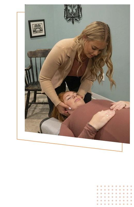 Chiropractor Kenosha WI DoniBeth Davis and Dianna Bindelli History HP Dr. Dianna Bindelli with patient in chiropractic session